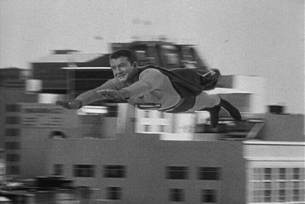 George Reeves soars through the air.
