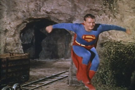 George leaps into the air.