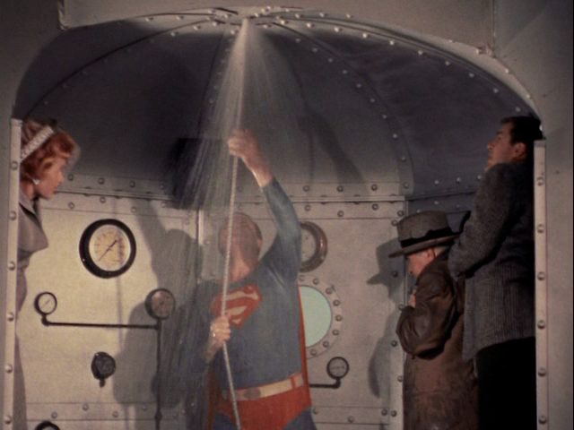 The Man of Steel raises the bathysphere.