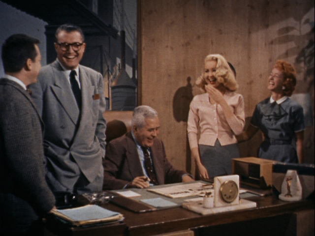 Back in Perry White's office.