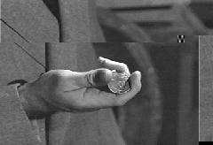 Clark explains why he wasn't hurt by the bullet.